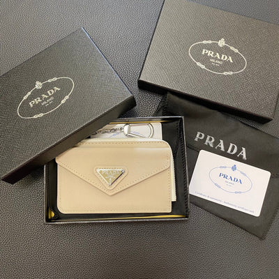 A side view of a PRADA Classic Card Holder Wallet, highlighting its slim profile and premium Saffiano leather construction.