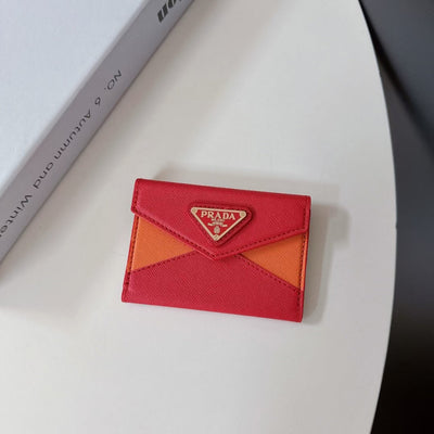 Elevate your style with PRADA's timeless accessory