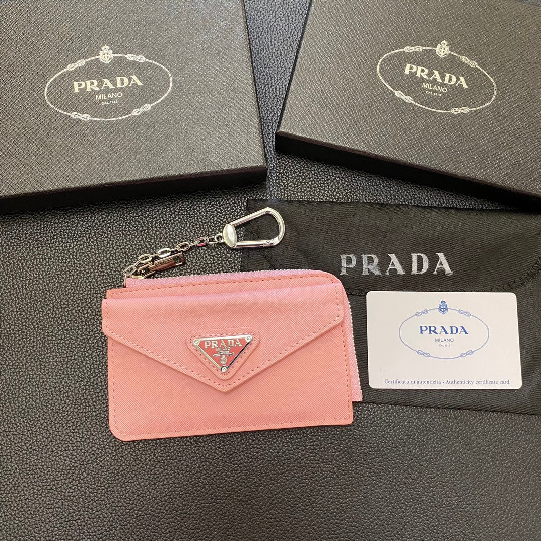 A stylish ensemble featuring a PRADA Classic Card Holder Wallet tucked neatly into a pocket, adding a touch of sophistication to the outfit.